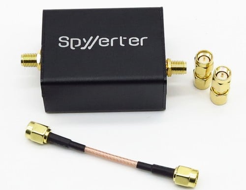 The SpyVerter in enclosure with bundled adapters.