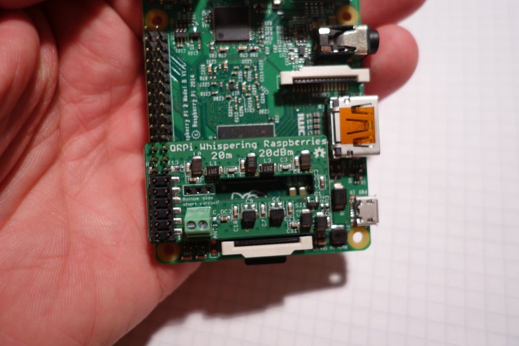 The WSPR shield sitting on top of a Raspberry Pi.